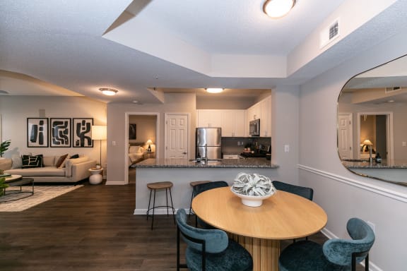 a living room and kitchen with a table and chairs at Willowest in Lindbergh, Atlanta, GA
