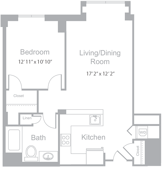 A floor plan of a room with a bedroom, living/dining room, kitchen, and bathroom.
