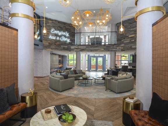 The resident lobby with cozy couches and tables at The Citizen at Shirlington Village, Arlington, Virginia