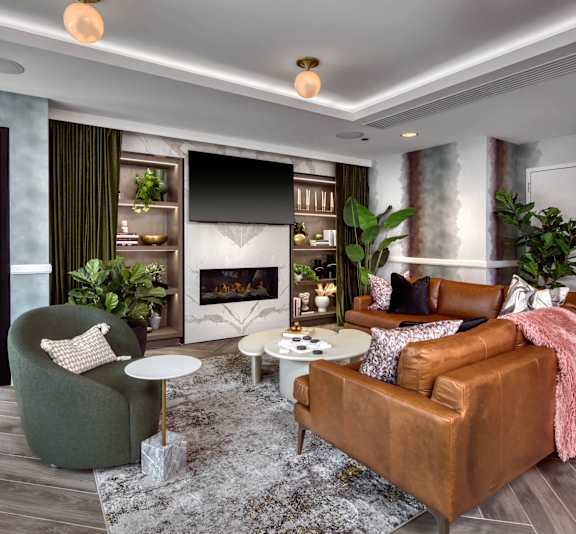 Brown and green couch at Flair Tower Apartments, Chicago, 60654