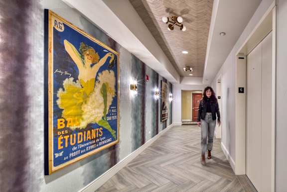 Women walking in hallway at Flair Tower Apartments, Chicago Illinois