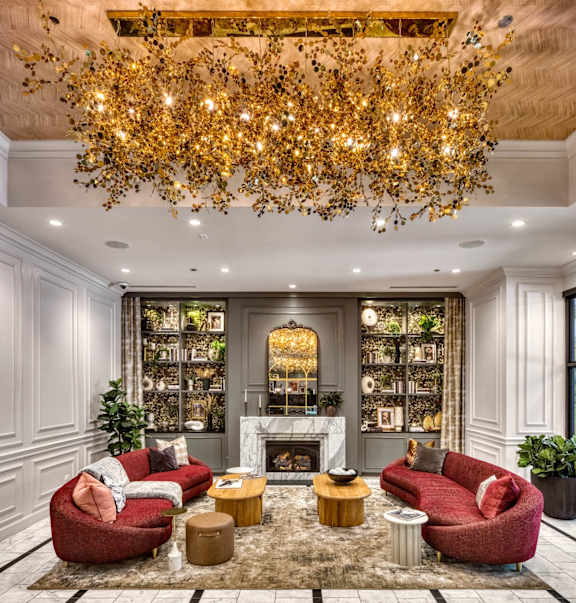 living room with a fireplace at Flair Tower Apartments, Chicago, IL 60654