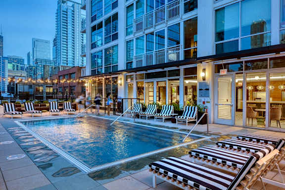 pool with building in the background at Flair Tower Apartments, Illinois, 60654