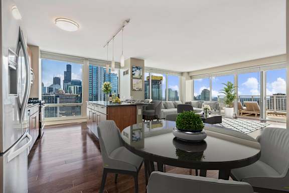 Room with multiple windows at Flair Tower Apartments, Chicago Illinois