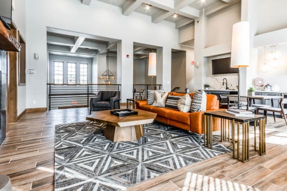 a living room with a couch and a table  at The Links at Plum Creek, Castlerock, CO, 80104