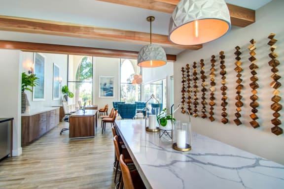 a dining room and living room in a house with a marble counter top at Veranda La Mesa, La Mesa, CA, 91942