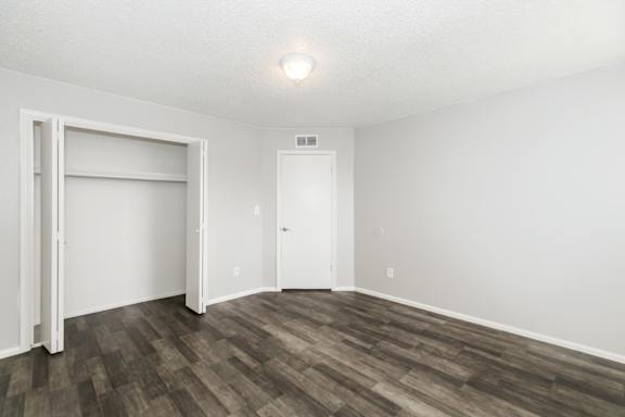Unfurnished bedroom at The Cara Apartments.