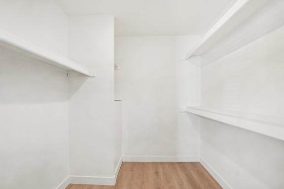 A white room with wooden floors and shelves. at The Viridian Apartments, Scottsdale, AZ, 85250