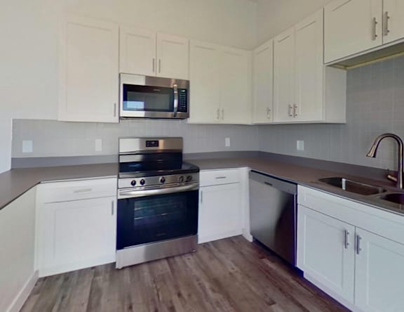 Apartment kitchen — representative home at Allero 59.
