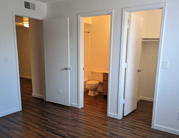A room with a toilet in the middle of it.