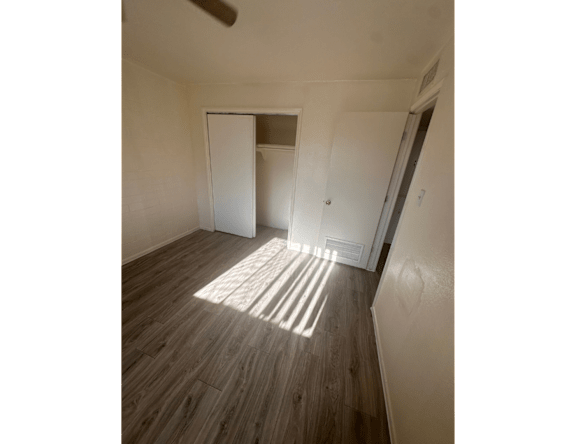 Unfurnished bedroom — representative home at Paradise Village Apartments.