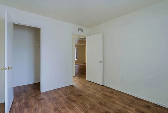 Room with closet and wooden floor at Sahuaro West Apartments, Phoenix, 85029