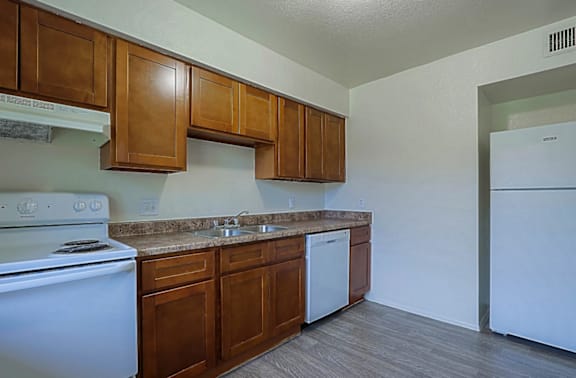 Kitchen with White Appliances at Sahuaro West Apartments, Phoenix