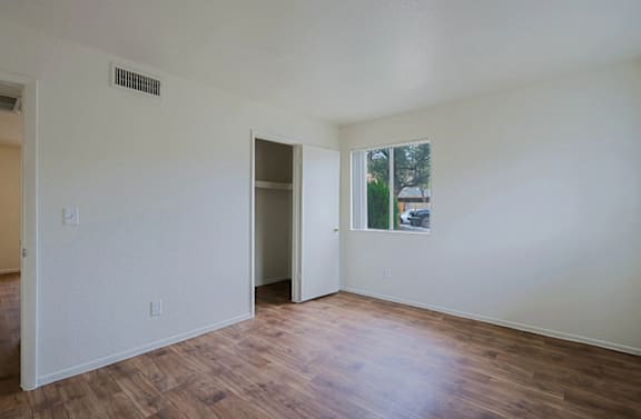 Vacant Room with Wooden Floor at Sahuaro West Apartments, Arizona