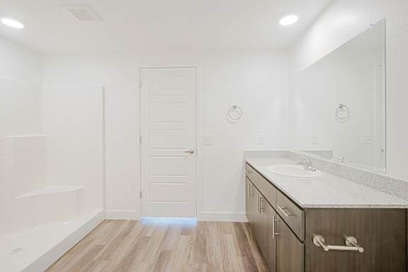 a bathroom with a sink and a tub and a mirror at 2051 Apartments, Arizona, 86301