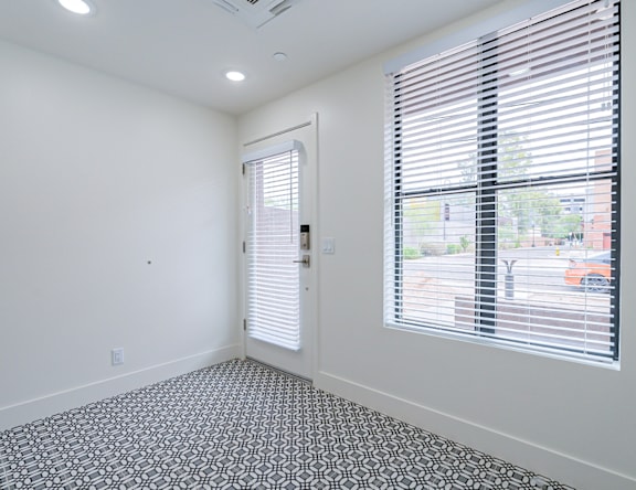 A room with a black and white patterned floor.