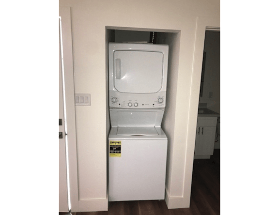 In-home laundry area — representative home at Pomelo Park.