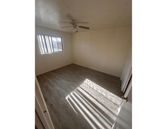Unfurnished bedroom — representative home at Paradise Village Apartments.