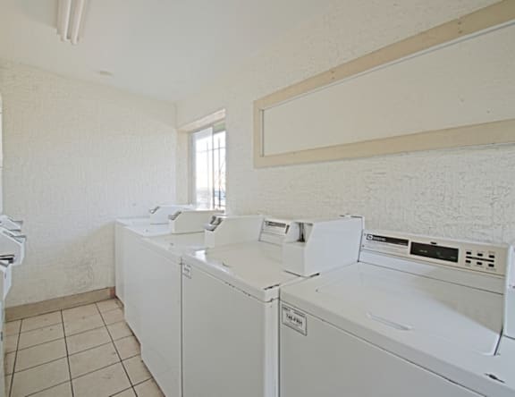 A laundry room with a washer and dryer.