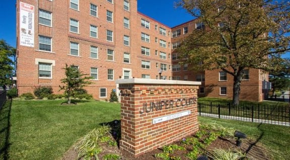 exterior view of juniper courts apartments in washington dc