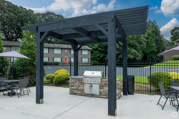Patio with grill and chairs at Broadway at East Atlanta, Atlanta, 30316