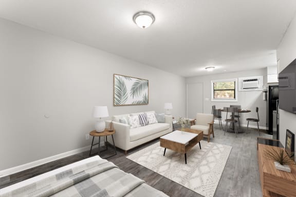a living room with a white couch and a wooden coffee table  at Balfour 296, Lilburn, 30047