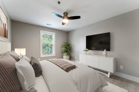 Spacious bedroom with ceiling fan at Woodbriar Management, LLC, Tucker, GA, 30084