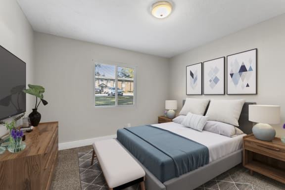 Spacious bedroom with plush carpet at Ridgewood Apartments, Lawrenceville, GA 30045