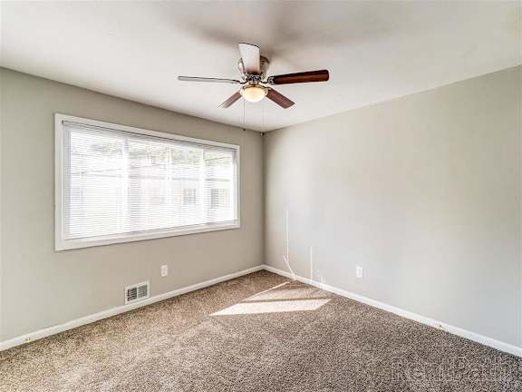 Room with window and carpeted floor at Balfour Chastain, Sandy Springs, Georgia