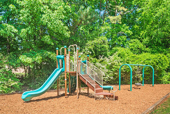 Playground with green slide1 at Pinewood Townhomes, Tucker, Georgia