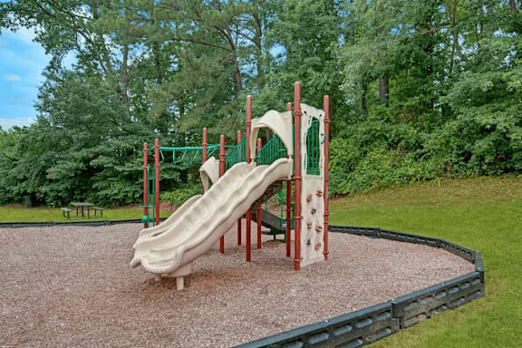 Playground with white slide at Lacota Apartments, Atlanta, GA