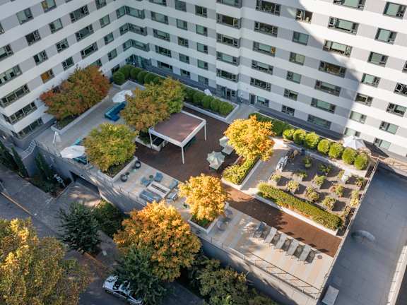 Floor Plan  an aerial view of a park in front of a building