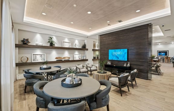 Game and card tables in resident lounge at Inspira, Florida