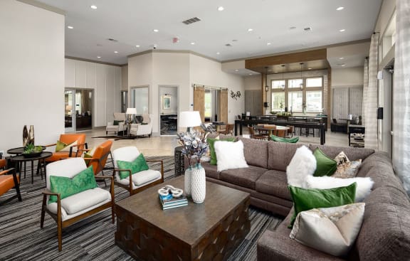 Clubhouse interior  with seating  areas at Carmel Vista, McDonough, 30253