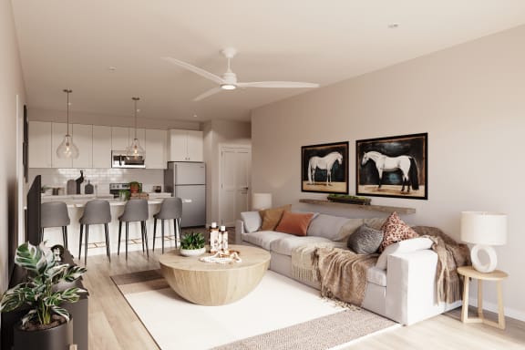 a rendering of a living room with a couch and a coffee table in front of a kitchen at Madison Prickett Preserve, Yardley Pennsylvania