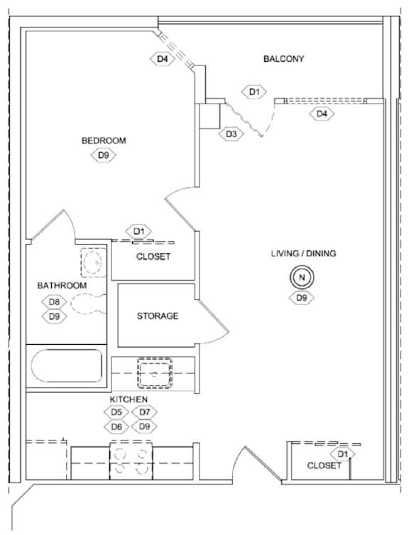 A floor plan of a house with a bedroom, living/dining area, kitchen, bathroom, and storage.
