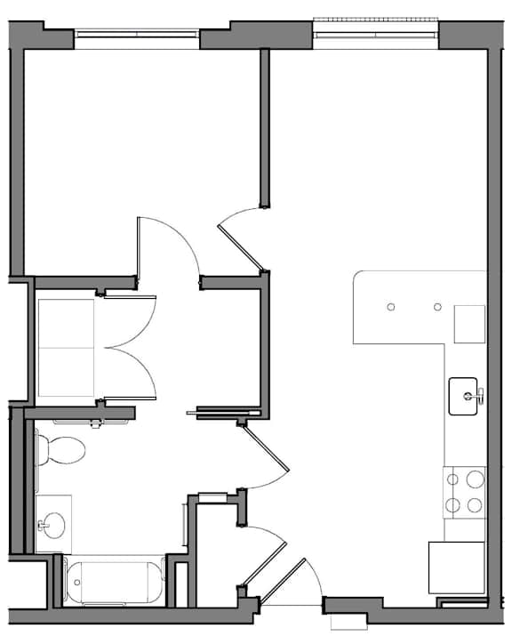 A black and white floor plan of a house with a kitchen, living room, and bathroom.