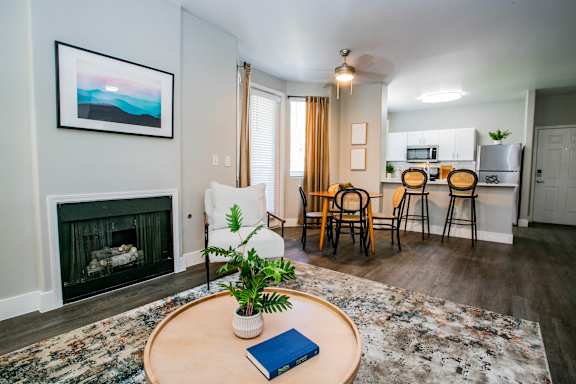 A living room with a fireplace at Octave Apartments, Las Vegas, NV, 89123