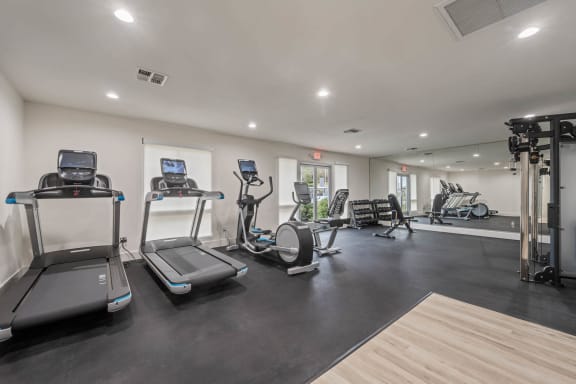 the gym is equipped with treadmills and other fitness equipment at Monterra Ridge Apartments, Canyon Country ,91351