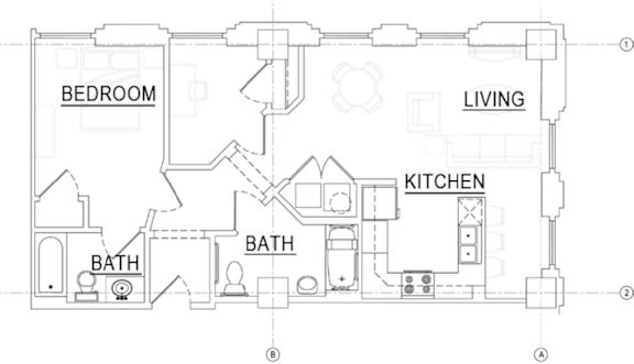 A floor plan of a house with a living room, kitchen, and two bathrooms.