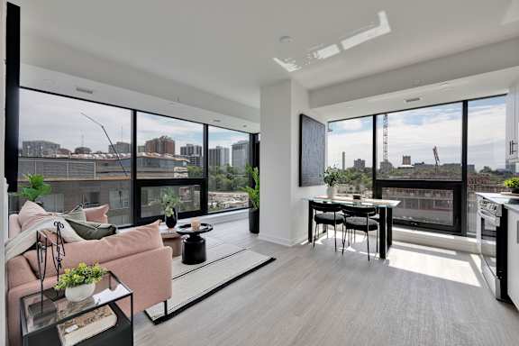 A modern living room with a view of the city.