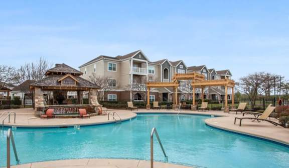 Clear blue pool view at Ansley Place Apartments, Houma, LA 70360