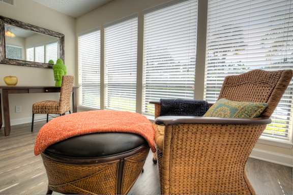 Sunroom at Town Place Apartments designed for a home office, meditation space, or indoor plant room, featuring natural light, large windows, and flexible living space.