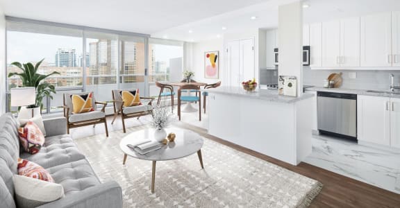 Staged suite, looking back at the kitchen from the living room.