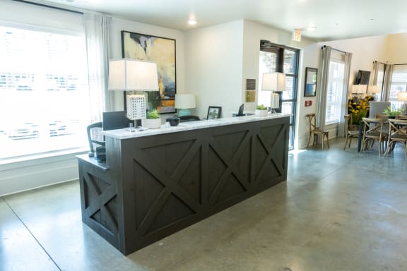a view of the leasing office from behind the reception desk