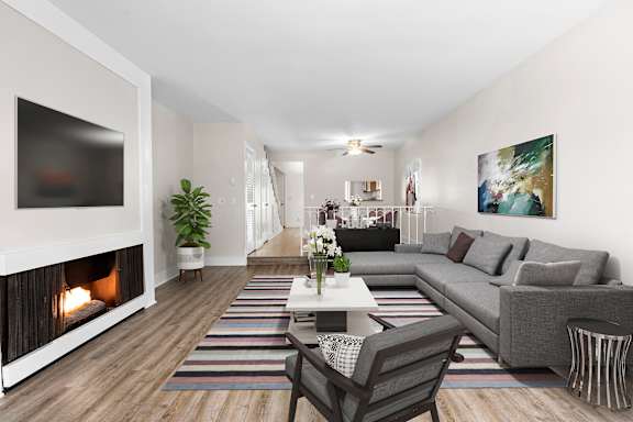A modern living room with a fireplace at Parkway Plaza Apartments, California, 90230