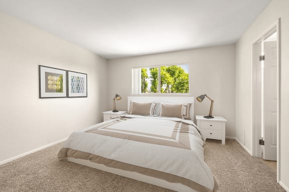 a bedroom with a bed and a window