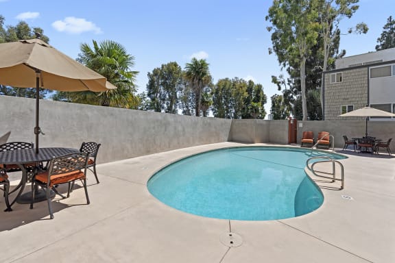 Pool With Lounge Chairs at Parkway Terrace Apartments, Culver City, CA