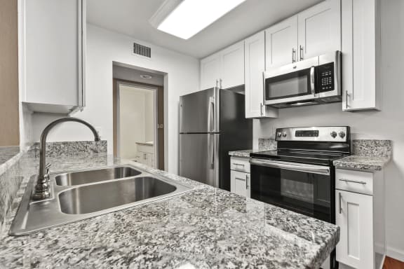 Granite Counter Tops In Kitchen at The Meadows at The Meadows at Westlake Village Apartments,Westlake Village