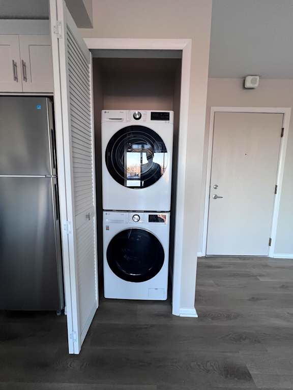 a front loading washer and dryer in a closet at Huntington Green Apartments, University Heights, OH